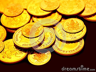 Gold coins embossed with images Stock Photo