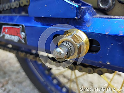 Gold color motorcycle screw nuts Stock Photo