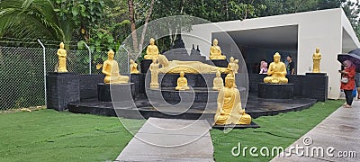 gold colored buddha statues on display to get to know buddhist culture. Editorial Stock Photo