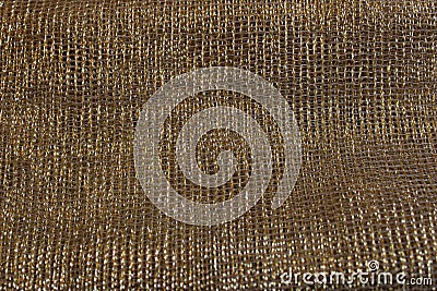 Gold colored mesh fabric Stock Photo