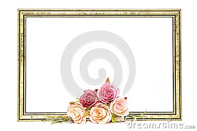 Gold colored wooden frame with roses Stock Photo