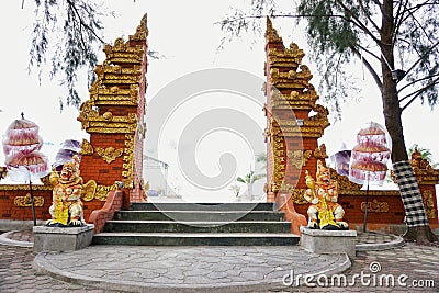 Gold colour traditional gate made of bricks Editorial Stock Photo