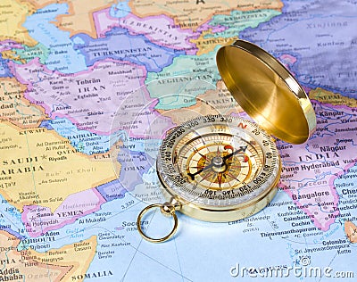 Gold compass on map of Asia Stock Photo