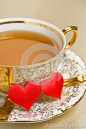 Gold cup tea Stock Photo