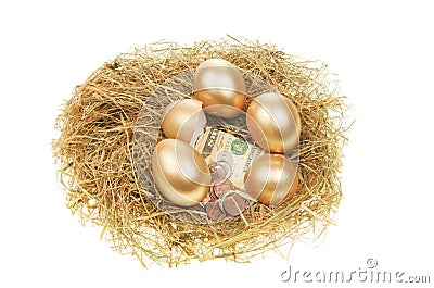 Gold eggs and money Stock Photo