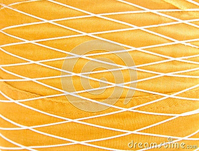 Gold fabric background with interlace of thread patterns texture Stock Photo