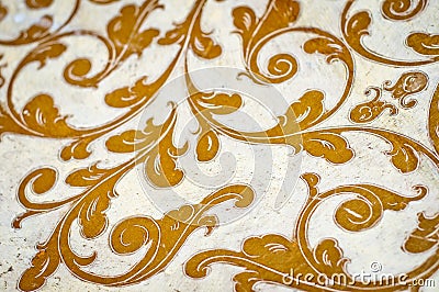 Gold flourish design. White background. Stock Photo