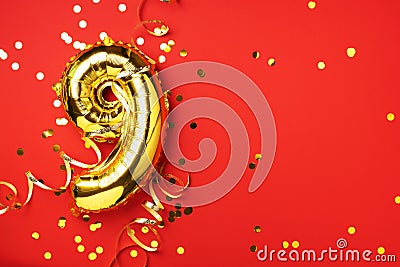 Gold foil balloon number and digit nine 9. Birthday greeting card. Anniversary celebration event. Banner. Copy space Stock Photo