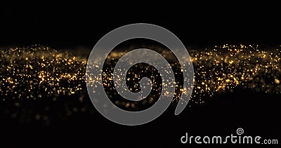 Gold glitter particles shine wave, shining gold sparks and yellow glittery bokeh light background. Gold glow and shimmering Stock Photo