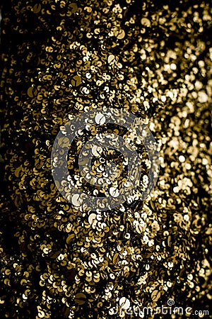 Gold glitter texture isolated on black square. Amber particles c Stock Photo