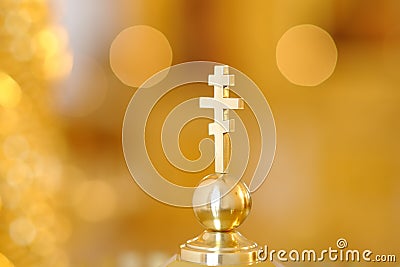 Gold Greek Orthodox cross close-up Stock Photo