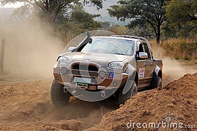 Gold GWM Steed on 4x4 Course Editorial Stock Photo