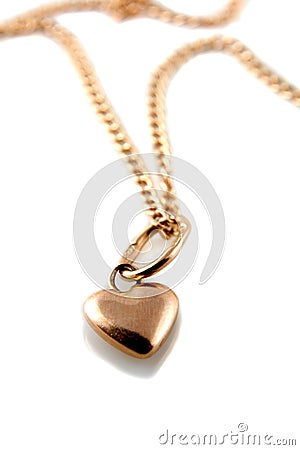 Gold heart pendant with chain Stock Photo