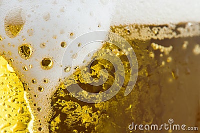 Gold Ice Cold Beer Foam With Bubbles Closeup Stock Photo