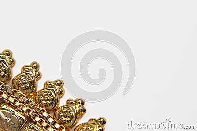 Gold Indian Arab women`s jewelry isolated on white background. Stock Photo