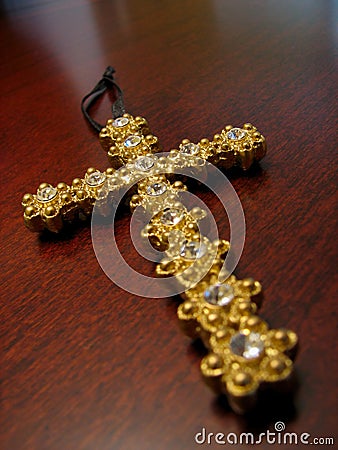 Gold jeweled cross Stock Photo