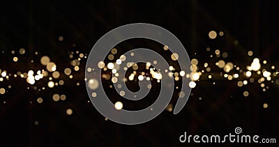 Gold light bokeh sparks, golden glitter shine. Shiny bright snow bokeh blur effect, shimmering dust light and magic glow sparkles Stock Photo