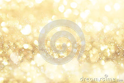 Gold light Festive Christmas background. Abstract twinkled bright background with bokeh defocused golden lights Stock Photo