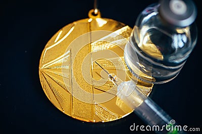 Gold Medal, Syringe and Medicine bottle for injection. Doping in sport, black edit space Stock Photo