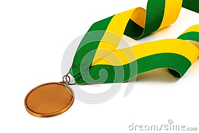 Gold medal on white background with blank face for text, Gold medal in the foreground. Stock Photo