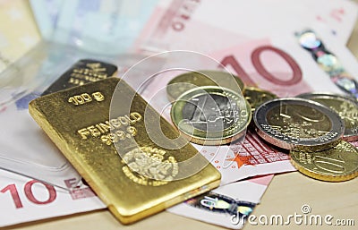 Gold and money Stock Photo