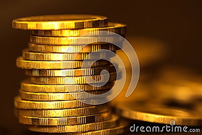 Gold money coin stacking on dark background Stock Photo