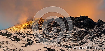 Gold mountain peak on sunset. High Tatras Stock Photo