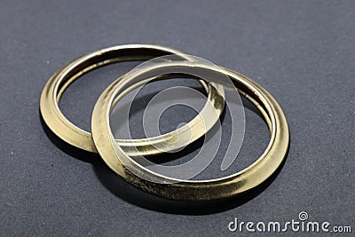 Gold,silver new design bangles jewellery on black blur background. Stock Photo