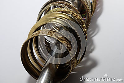 Gold,silver new design bangles jewellery on black blur background. Stock Photo