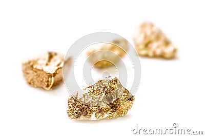 Gold nuggets on white background. Stock Photo