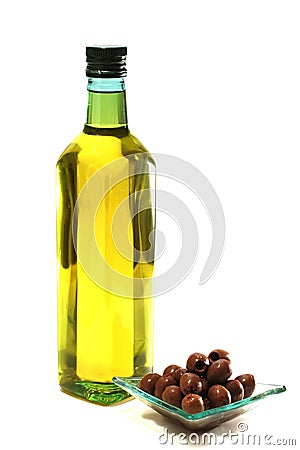 Gold olive oil in buttle over white Stock Photo
