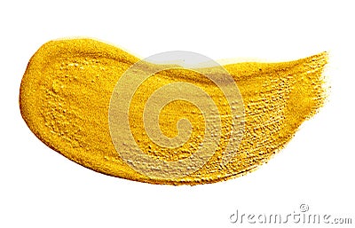 Gold paint Brush stroke isolated on white background. Flowing abstract Gold metallic paint smudge close-up. Lipgloss Stock Photo