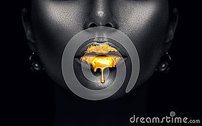 Gold paint drips from the lips, golden liquid drops on beautiful model girl`s mouth, creative abstract dark black skin makeup Stock Photo