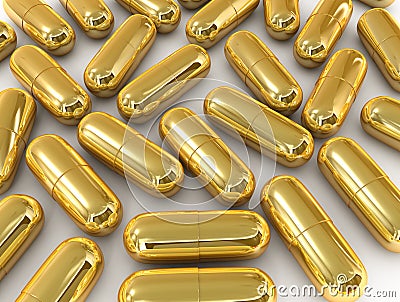 Gold pill capsule Stock Photo