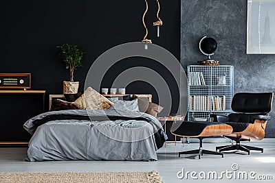 Guy bedroom with chaise lounge Stock Photo