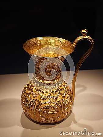 Gold pitcher Editorial Stock Photo