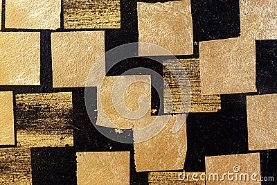 Gold plate on wall black, gold leaf, golden square foil on black background, black tile wall with gold plate abstract texture Stock Photo