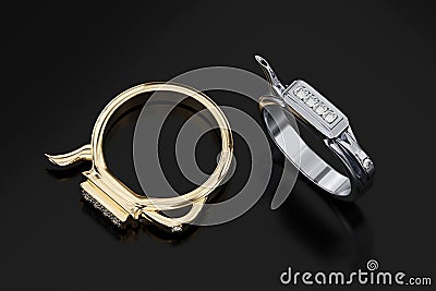 Gold and platinum diamond ring on a black background. 3D rendering. Stock Photo