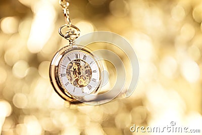 Gold pocket watch background Stock Photo