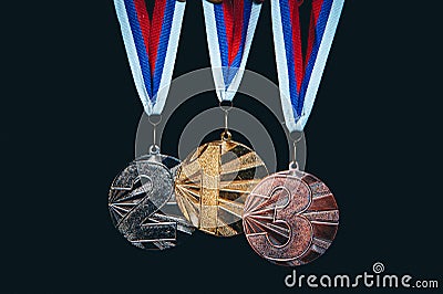 Gold silver and bronze medal on black background Editorial Stock Photo