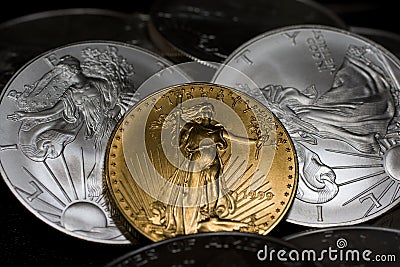 Gold and silver coins Stock Photo