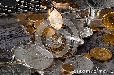 Gold & Silver Coins with Silver Bars on map Stock Photo