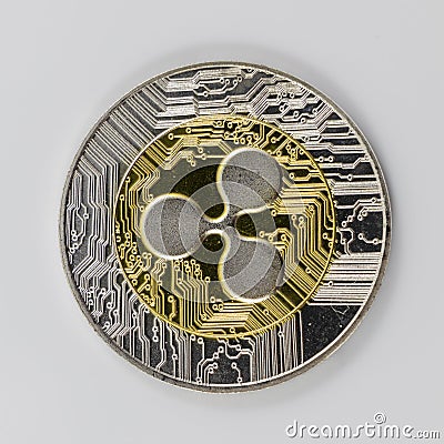 A Gold and Silver Ripple XRP Token Editorial Stock Photo