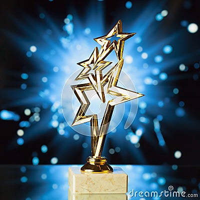 Gold stars trophy against blue shiny background Stock Photo