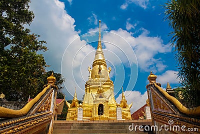 Gold stupa at pagoda of Buddhist temple at Koh Samui island in Thailand Stock Photo
