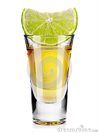 Gold tequila shot with lime isolated on white Stock Photo