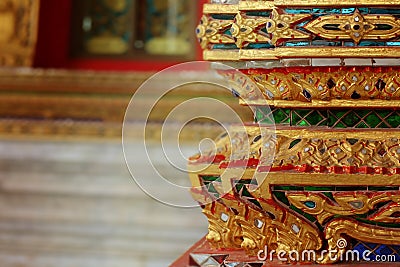 Gold Thai pattern carving Kanok picture in temple Stock Photo