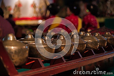 Yogjakarta, Indonesia, march 10, 2020: Gold vessels in a Hindu temple Editorial Stock Photo
