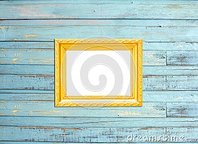 Gold Vintage picture frame on blue wood background Stock Photo