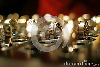 Gold wedding rings in jewelry shop Stock Photo